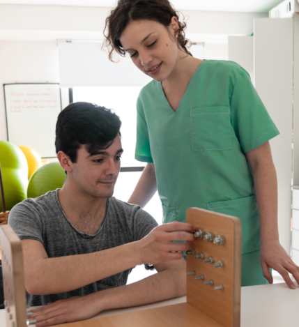 ot Professional healthcare worker assisting young male patient with a medical test or device.