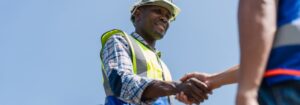 construction worker shaking hands